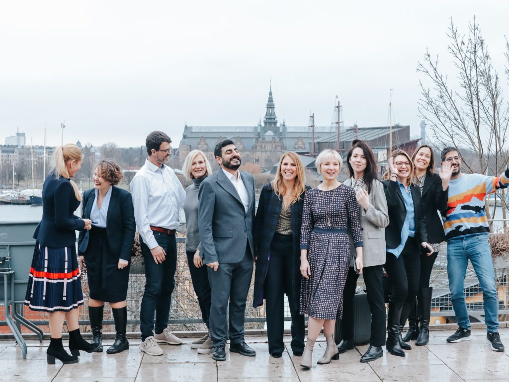 Group photo in front of Stockholm with Mentor International